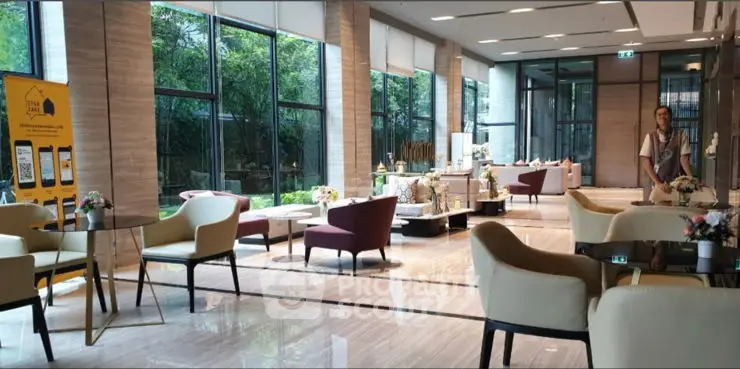 Luxurious modern living room with large windows and stylish furniture