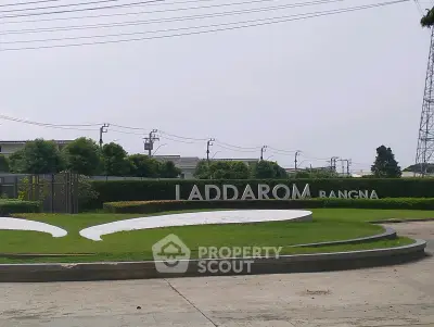 Laddarom Bangna entrance with lush greenery and modern design