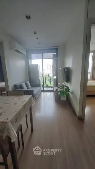 Cozy apartment interior with balcony view and modern furnishings