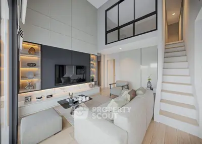 Modern living room with high ceiling and stylish decor