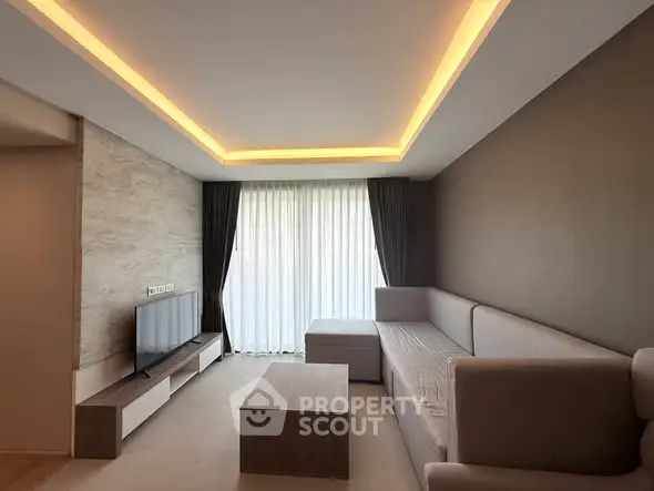 Modern living room with sleek furniture and ambient lighting