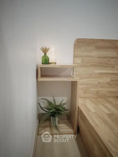 Modern minimalist bedroom with wooden furniture and stylish decor