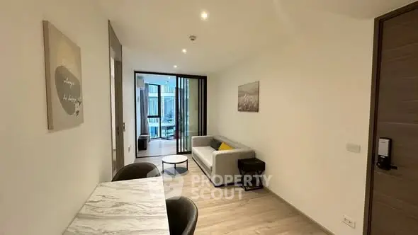 Modern living room with sleek furniture and open layout, perfect for urban living.