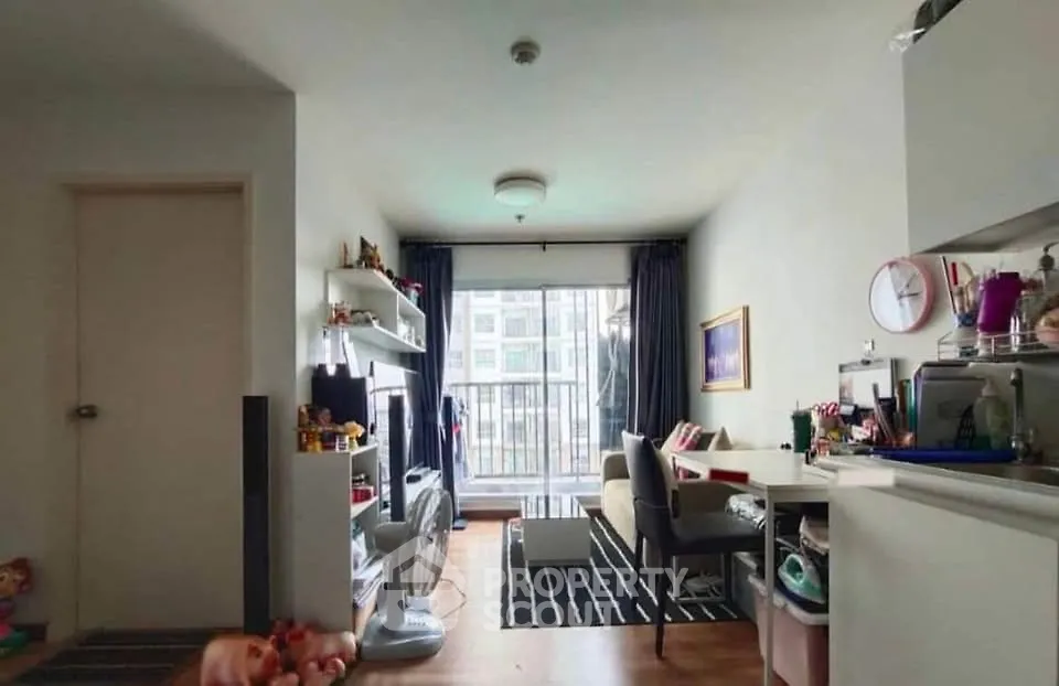 Cozy living room with modern decor and large window view