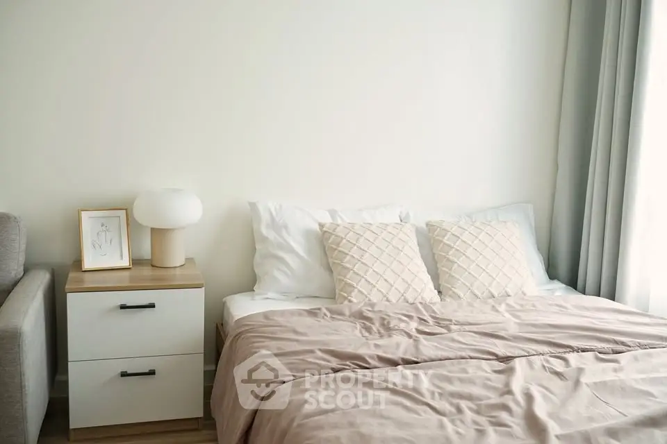 Cozy bedroom with modern decor and natural light