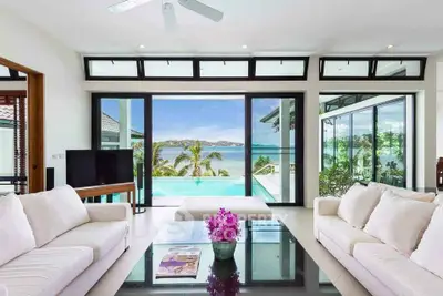 Luxurious living room with stunning ocean view and modern decor