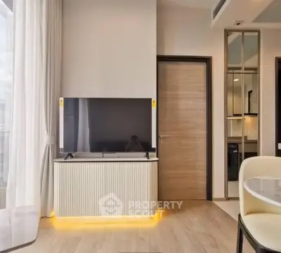Modern living room with sleek TV setup and stylish decor