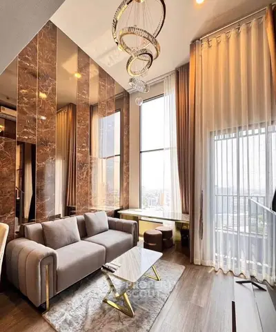 Luxurious high-ceiling living room with modern decor and stunning city view.