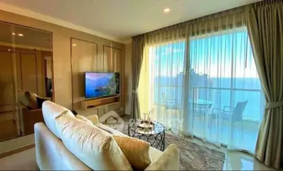 Luxurious living room with stunning ocean view and elegant decor