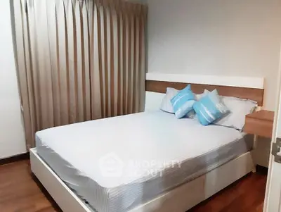 Cozy bedroom with modern decor and natural light