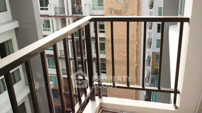 Modern apartment balcony with city view, perfect for urban living.