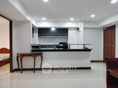 Spacious open-layout kitchen with modern design and elegant furnishings