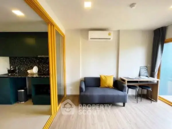 Modern apartment with open layout, cozy living area, and stylish kitchen.