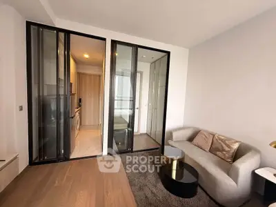 Modern living room with sliding glass doors and cozy seating area