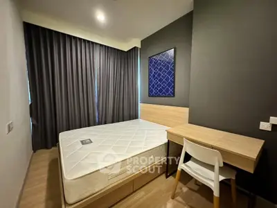 Modern bedroom with stylish decor and natural light