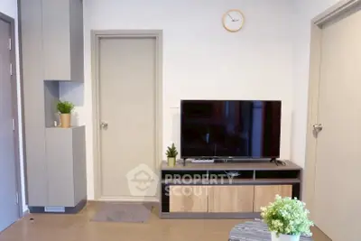 Modern living room with sleek TV stand and minimalist decor