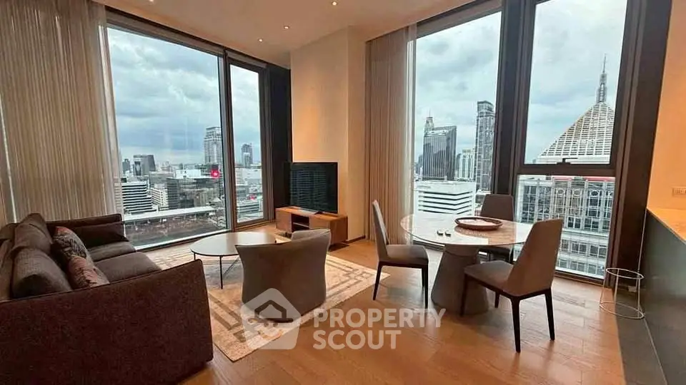 Luxurious high-rise living room with stunning cityscape views and modern furnishings.