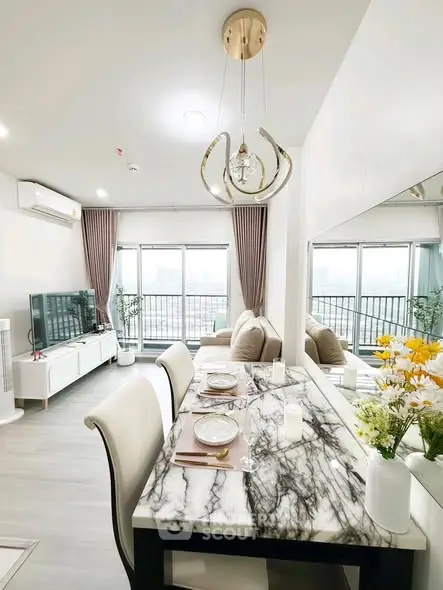 Modern living room with dining area, featuring elegant marble table and large windows with city view.
