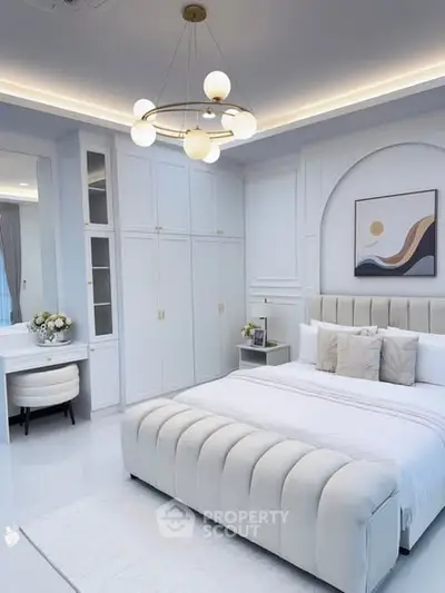 Luxurious modern bedroom with elegant decor and plush furnishings