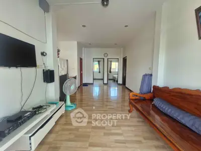 Spacious living room with wooden flooring and modern decor
