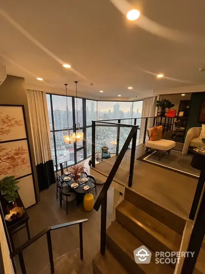 Luxurious duplex living room with stunning city view and elegant decor