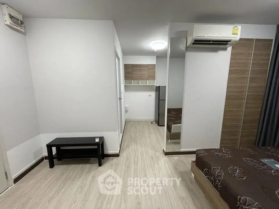 Modern bedroom with air conditioning and stylish decor