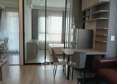 Modern studio apartment with open layout and stylish furnishings