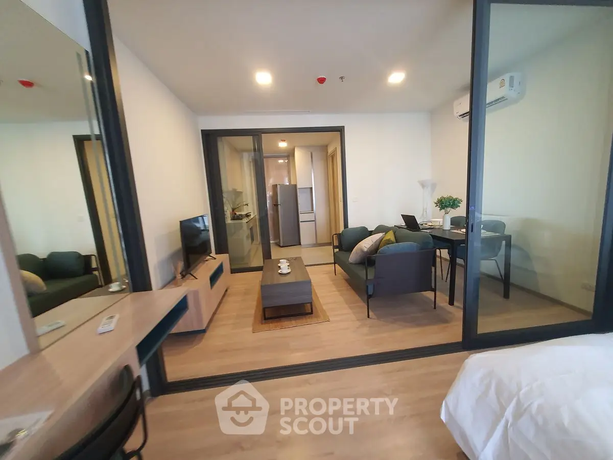 Modern living room with open layout and stylish furniture in a contemporary apartment.