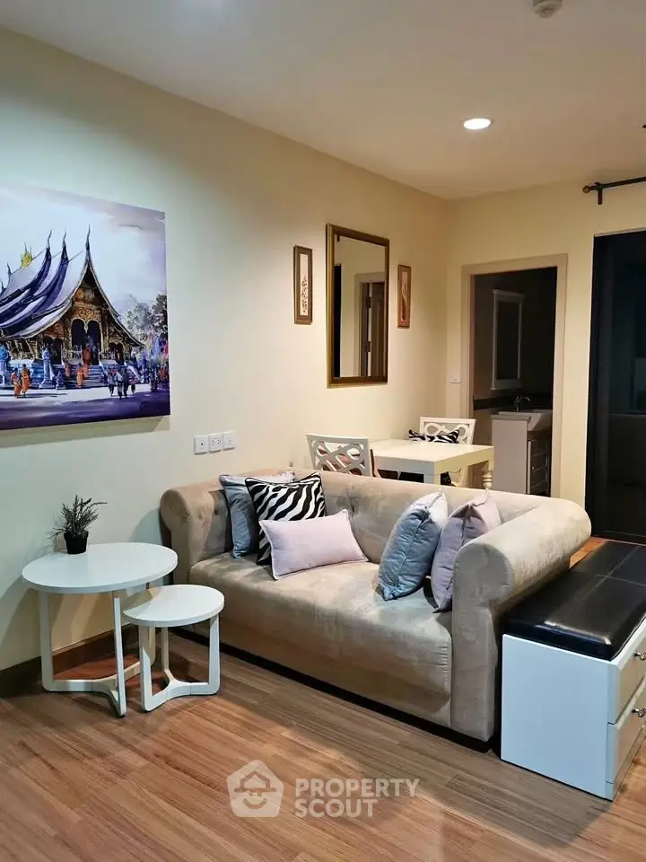 Cozy living room with stylish decor and comfortable seating in modern apartment.