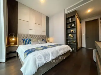 Luxurious bedroom with elegant decor and plush bedding in modern apartment