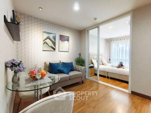 Modern studio apartment with cozy living area and stylish bedroom