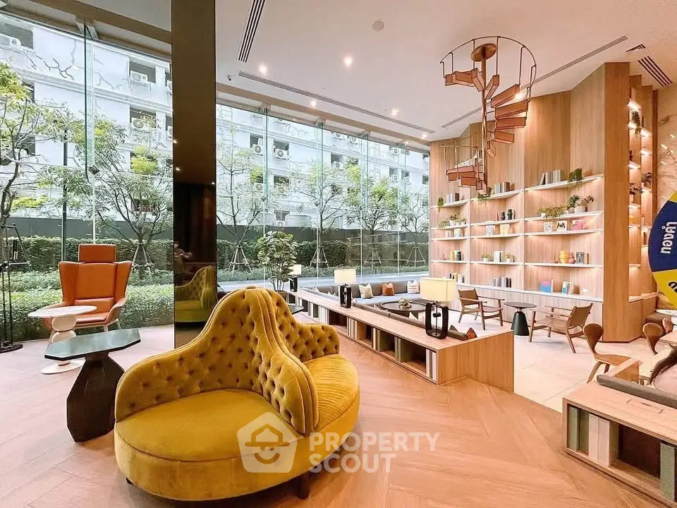 Luxurious modern living room with stylish furniture and large windows overlooking a lush garden.