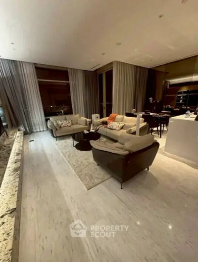 Luxurious modern living room with elegant decor and city view, perfect for sophisticated urban living.