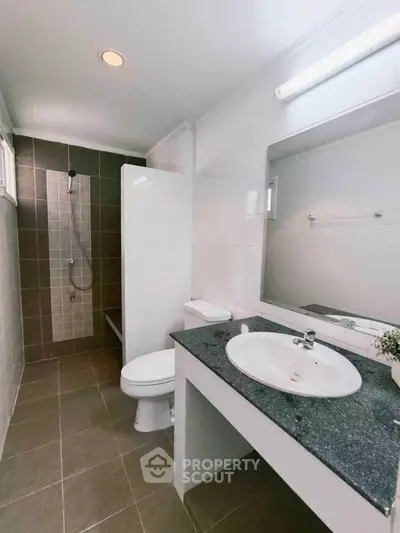 Modern bathroom with sleek design and spacious layout