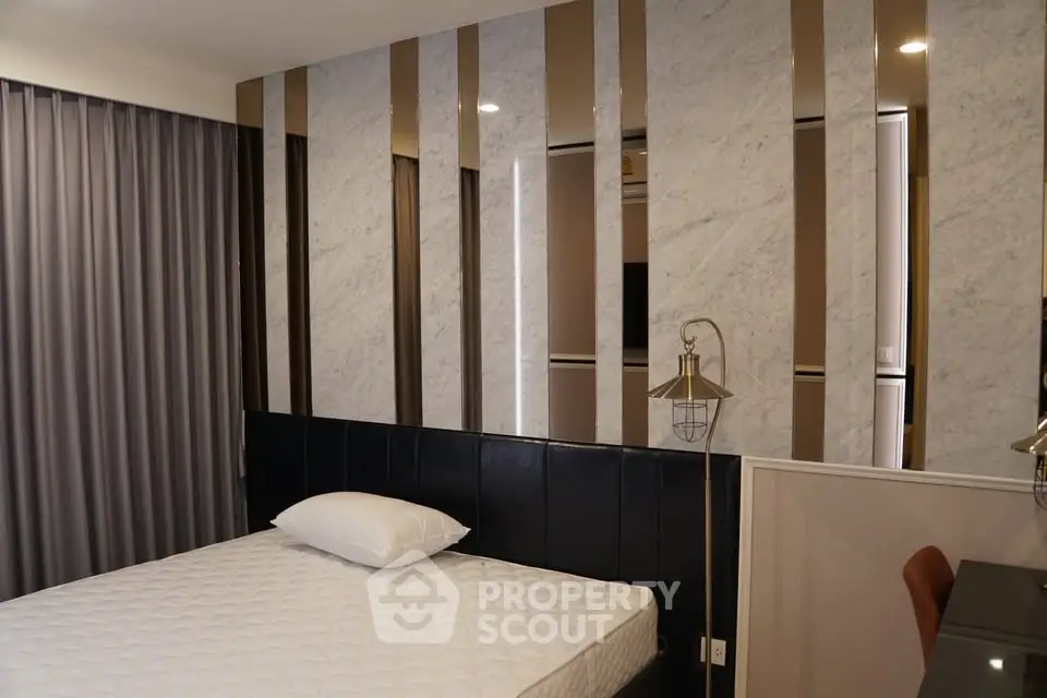 Luxurious bedroom with modern design and elegant marble accents