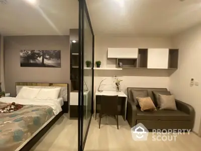 Modern studio apartment with a seamless blend of sleeping and living areas, featuring a cozy bed, comfortable sofa, and sleek wall-mounted shelves.