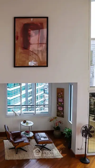 Stylish modern living room with city view and elegant decor