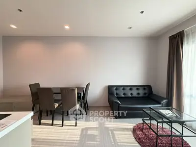 Modern living room with sleek furniture and natural light