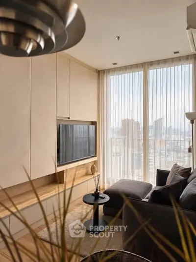 Modern living room with floor-to-ceiling windows and city view