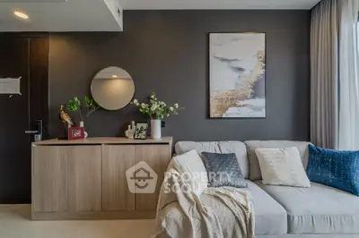 Modern living room with stylish decor and cozy sofa in elegant apartment