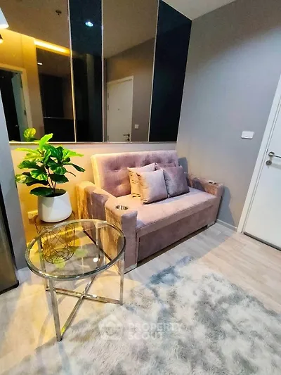 Cozy living room with plush sofa and modern decor in stylish apartment