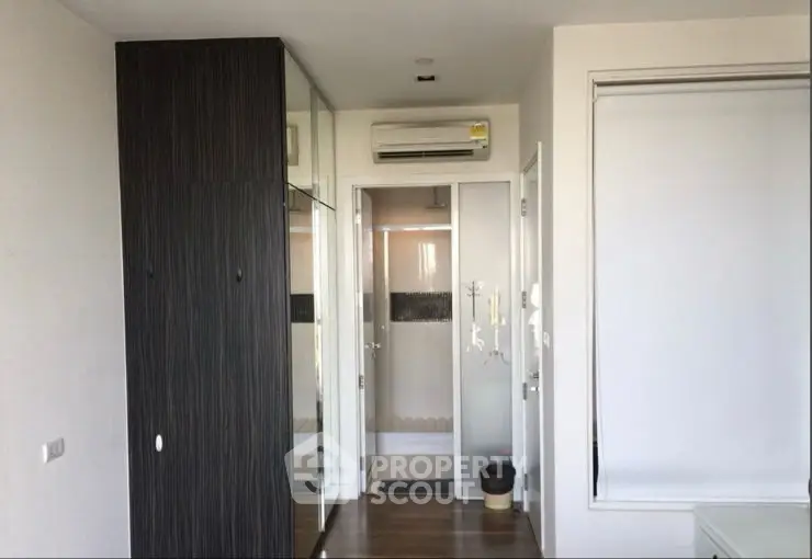 Modern interior with sleek air conditioning unit and minimalist design.