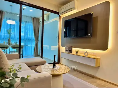 Modern living room with sleek design and ambient lighting