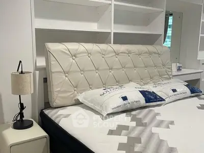 Luxurious bedroom with elegant tufted headboard and modern decor