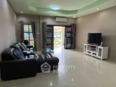 Spacious living room with modern furniture and natural light