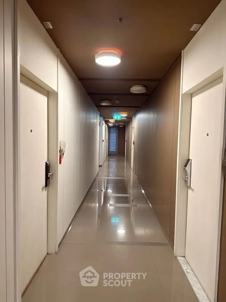 Modern apartment corridor with sleek design and polished floors