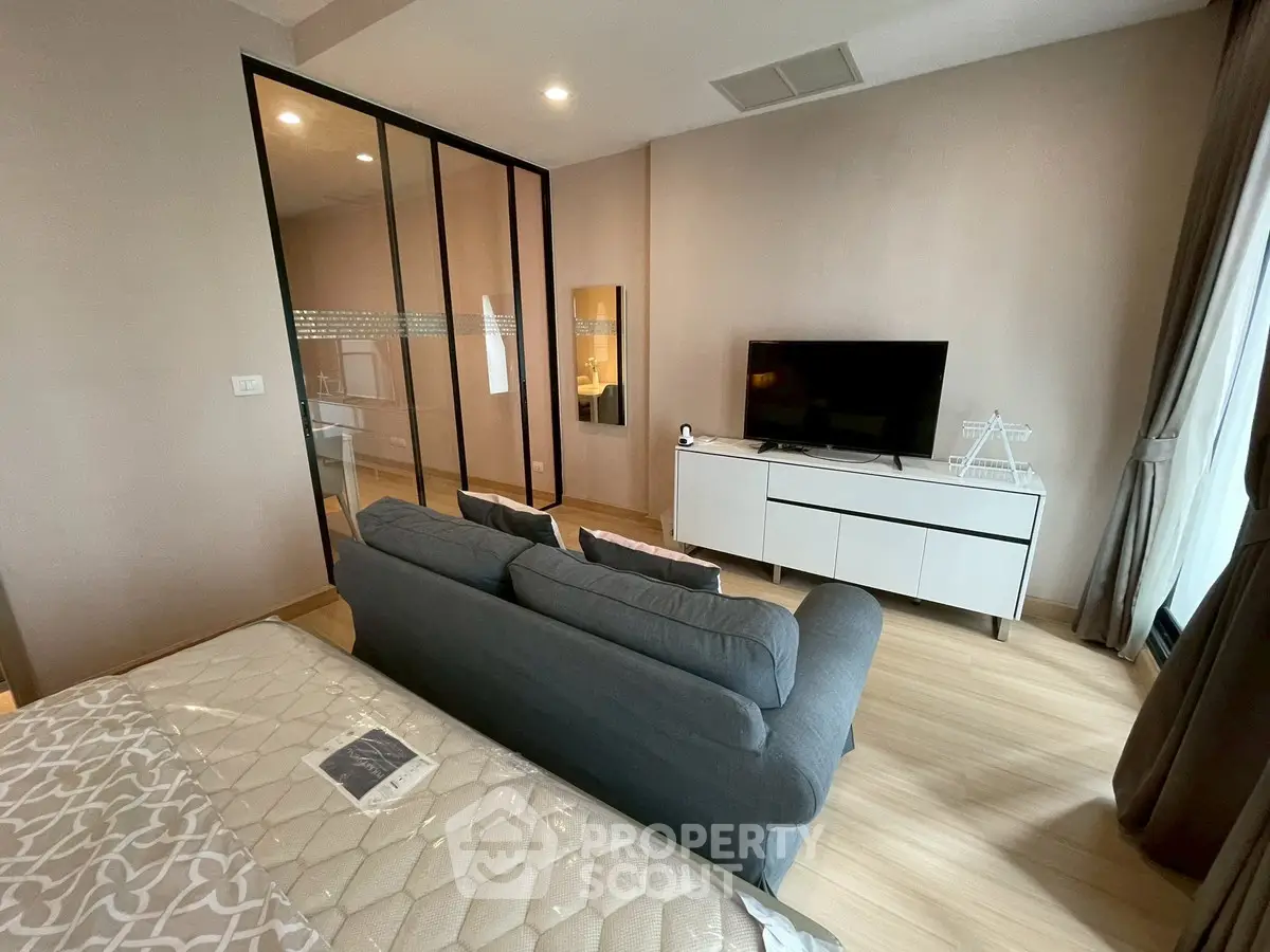 Modern living room with sleek design and cozy ambiance