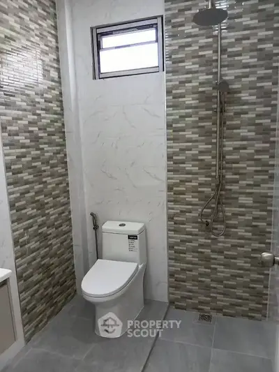 Modern bathroom with stylish tile design and sleek fixtures