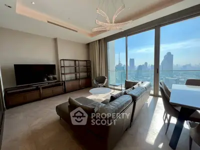 Luxurious living room with stunning city view and modern furnishings.
