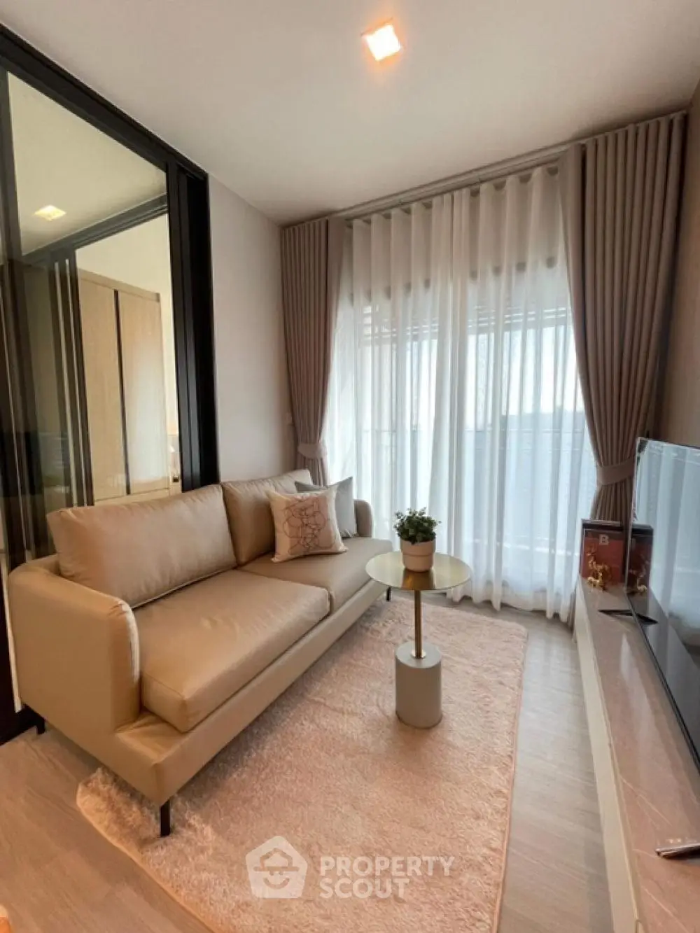 Modern living room with cozy sofa and elegant decor